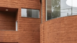 fachada_curva_revestimento_vermelho